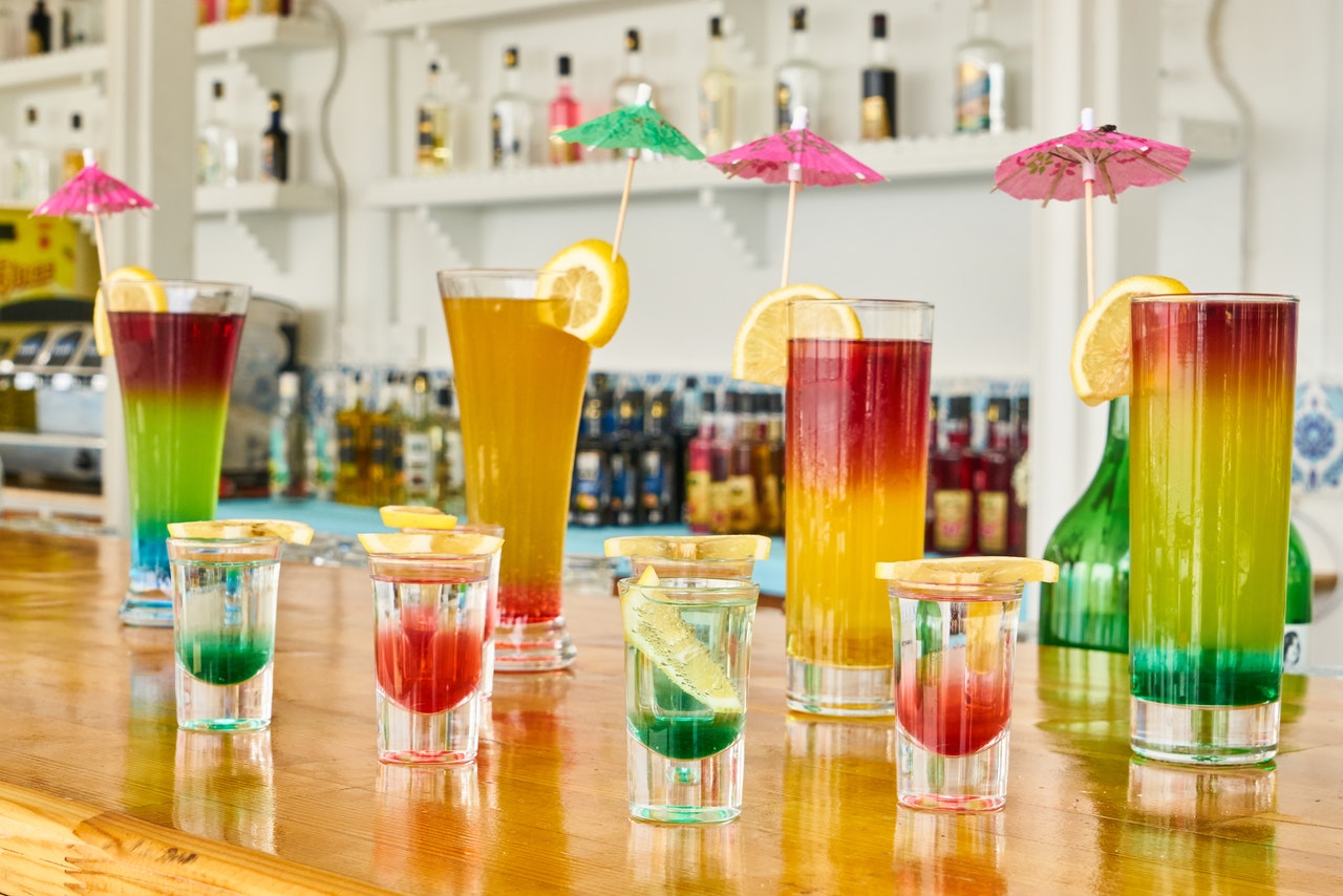 a variety of glasses with drinks/Cocktail Birthday Party Ideas